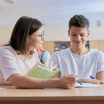special education teacher helping student