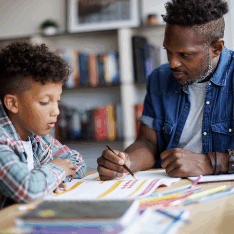 dyslexic child working with father